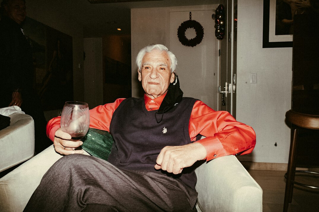 Retired Swiss television presenter smiling in a formal blazer